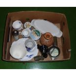 A box containing pottery items