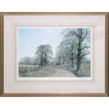 A framed print depicting a country lane scene