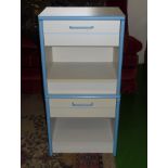 A pair of bedside cabinets