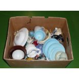 A box of assorted pottery items including Poole part teasets