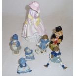 Seven pottery figures