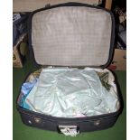 A suitcase containing fabric