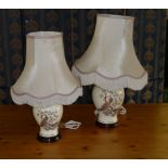 A pair of table lamps and shades