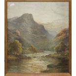 A framed watercolour of a Highland scene