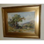 A gilt framed watercolour depicting a rural scene, image size 26cm x 34cm