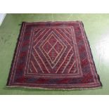 A hand woven wool Tribal Gazak rug, 113cm x 122cm