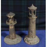 Two metal lighthouse lamps