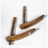 A pair of vintage wooden shoe tree stretchers