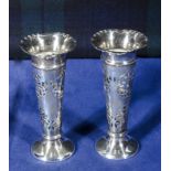 A pair of silver spill vases