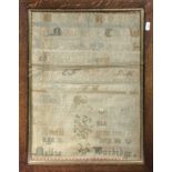 A framed sampler dated 1888 size 18cm x 30.5cm