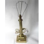 A brass Corinthian column table lamp