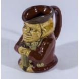 A character jug 12cm high