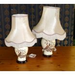 A pair of table lamps and shades