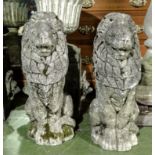 A pair of late Victorian reconstituted stone lions.