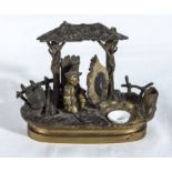 A bronze inkwell