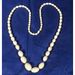 An ivory bead necklace