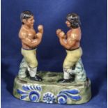 A 20th century Staffordshire style figure group of boxers