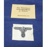 World War II German SS envelope for smoking pipe together with a WWII vest eagle