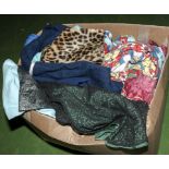 A large box of fancy dress outfits including a gollywog outfit