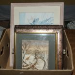 A box containing framed prints and watercolours