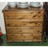 A pine chest of four drawers