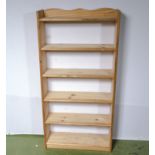 A pine open bookcase