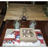 A Christmas place mat set together with Christmas decorations