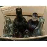A box containing glass bottles
