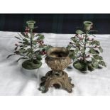 A pair of Christmas candlesticks together with a brass ornamental item