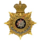 Badge. East Surrey Regiment Victorian Officer’s helmet plate circa 1881-1891. A good gilt example.