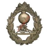 Badge. Cossipore Artillery Volunteers helmet plate. A fine and extremely rare die struck silvered