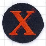 102 (Lincs) LAA Regiment RA cloth formation sign circa 1941-46. Red ‘X’ embroidered on felt black