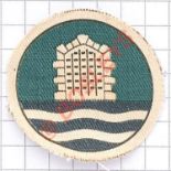 101st Coast Artillery Brigade printed cloth formation sign. White gateway and waves on white edged
