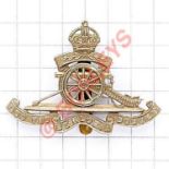 Territorial Artillery OR’s white metal cap badge. Die-stamped as regulars but bearing laurel spray