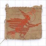 2nd Anti-Aircraft Division WW2 cloth formation sign. Red witch on broomstick printed on khaki