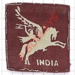 44th Indian Airborne Division WW2 printed cloth formation sign. Maroon rectangle bearing Pegasus