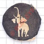 WW2 22nd East African Brigade cloth formation sign. White trumpeting elephant printed on black disc.