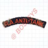 R.A. ANTI-TANK scarce WW2 cloth shoulder title. Red embroidered on navy.