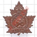 Canadian 38th Bn. CEF bronze WW1 cap badge. Die-stamped. Loops