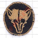 10th Armoured Division WW2 cloth formation sign Pinky red fox’s mask embroidered on black disc.