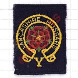 306 HAA Regiment Royal Artillery cloth formation sign. Dark blue rectangle embroidered with circular