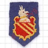 252nd Field Regiment, Royal Artillery cloth embroidered formation sign. Blue felt shield charged