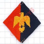 646 Light Anti-Aircraft Regt. Royal Artillery cloth formation sign. Golden eagle finial from