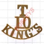 T / 10 / KING’S post 1908 King’s Liverpool brass shoulder title. Loops HQ 7 Fraser St. Liverpool.