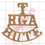 T / RGA / BUTE brass Royal Garrison Artillery shoulder title circa 1908-20. Loops Mountain Battery