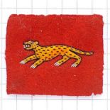 Indian. Delhi District WW2 cloth formation sign. Yellow leopard embroidered on red rectangle. Four