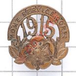 Home Service Corps 1915 rare WWI bronze cap badge. Issue stamped on reverse Loops September 1914-