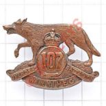 Canadian 107th (Winnipeg) Bn. CEF bronze WW1 cap badge. Die-stamped. Loops