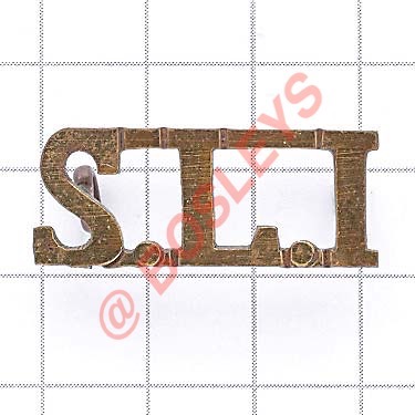 SLI (Shropshire LI) Victorian 2nd pattern brass shoulder title. (Westlake 1265) Loops