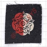 8th Bn. York & Lancaster Regiment cloth formation sign. Black square printed with a rose, half